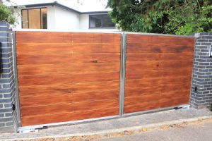 Electric wooden entrance gates in Surrey
